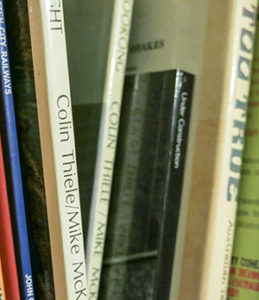 a row of books on a bookshelf