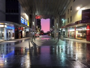 Sunrise breaking through after a rain, in a major city mall